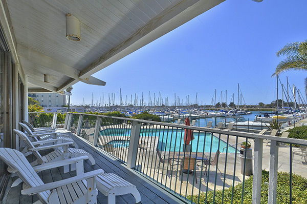 chairs by the pool at the marina club